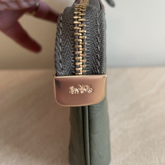 Coach Signature Embossed Leather Wristlet - Picture 7 of 16